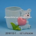 Fashionable ceramic flower planter with ceramic snowman statue for wholesale